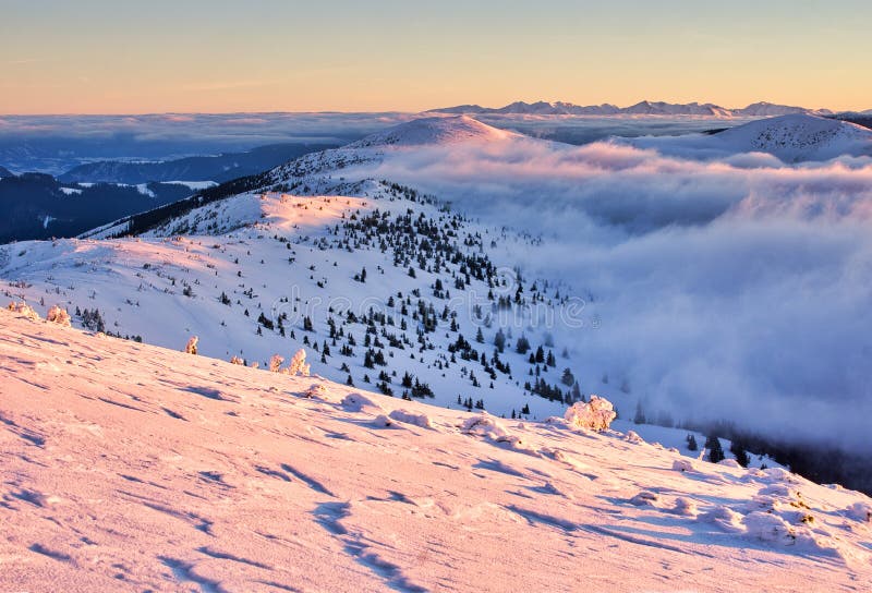 Velka Hola mountain in Low Tatras mountains during winter sunrise