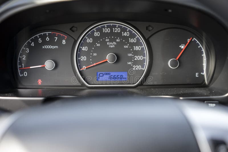 Picture of dashboard and speedometer in kilometer, including revolution per minute and fuel level and odometer. Picture of dashboard and speedometer in kilometer, including revolution per minute and fuel level and odometer