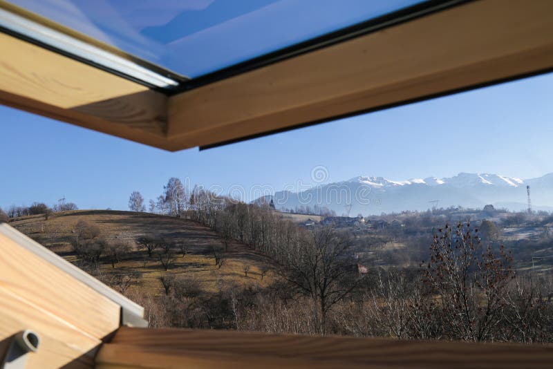 Velux from an mountain lodge with an beautiful view.