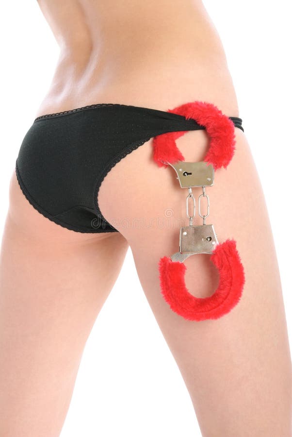 Velvet handcuffs on female underwear