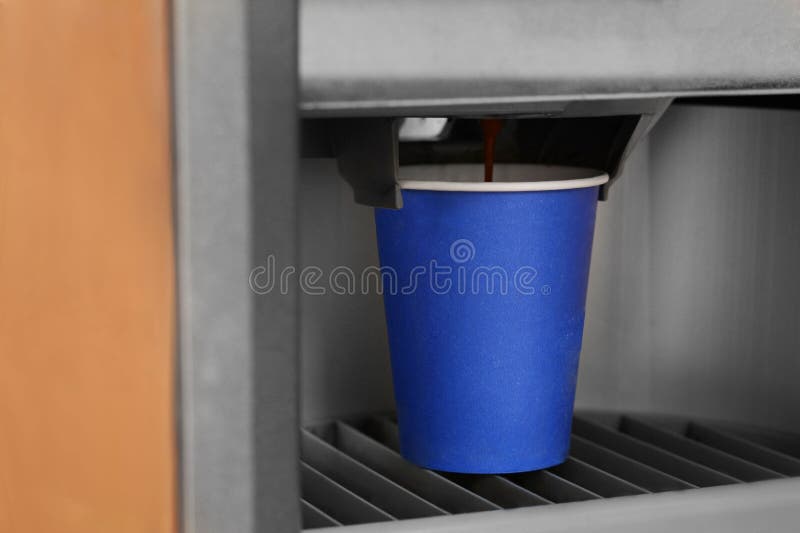 Vending Machine Pouring Coffee in Paper Cup, Closeup Stock Image