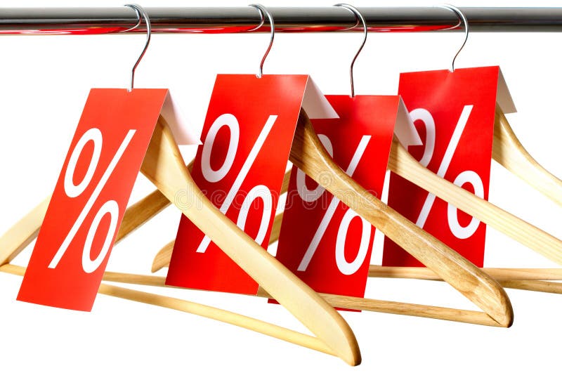 Photo of hangers with red labels showing holiday discount and sale. Photo of hangers with red labels showing holiday discount and sale