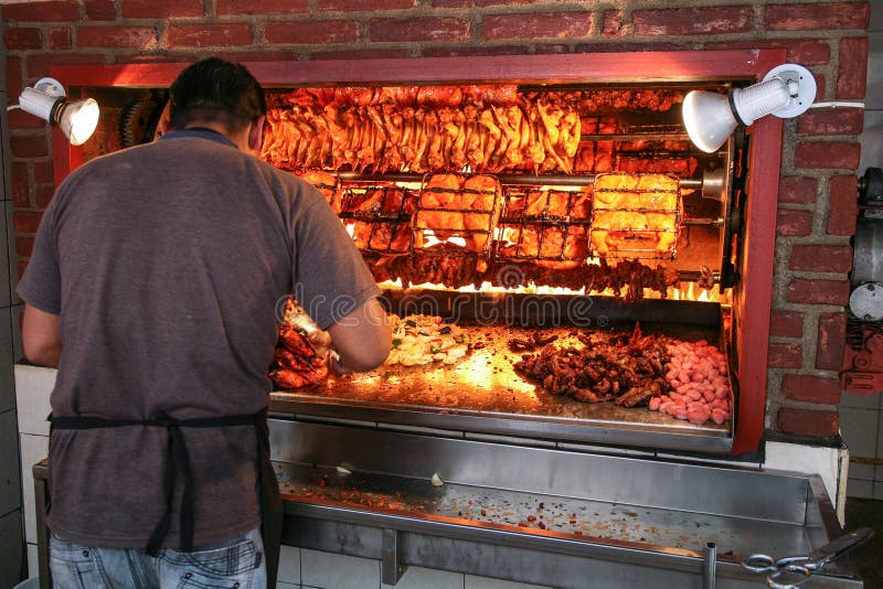 Vendor selling grilled chicken in a local shop of Taxco De Ala royalty free stock photography Vendor selling grilled chicken in a local shop of Taxco De Ala royalty free stock photography