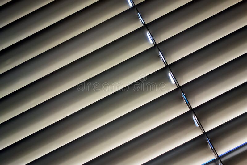 Venetian blinds for shade at the window