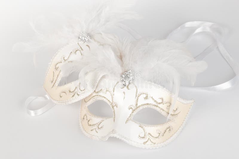Venetian carnival masquerade mask in white and gold. Venetian carnival masquerade mask in white and gold