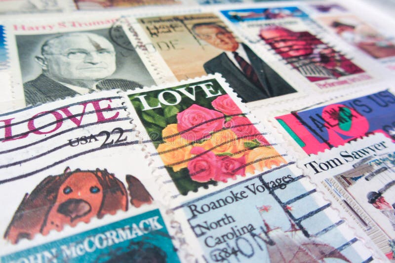 VENICE - APRIL 15: Aged USA stamps texture (US postal service -