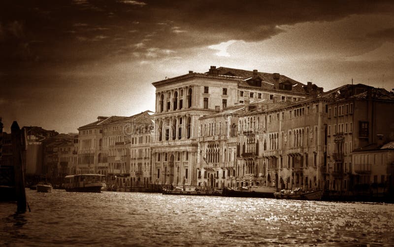 Venice Canal. Sepia toned antique looking image of a canal in Venice, Italy. Image has a heavy film grain effect added to it stock photos Venice Canal. Sepia toned antique looking image of a canal in Venice, Italy. Image has a heavy film grain effect added to it stock photos