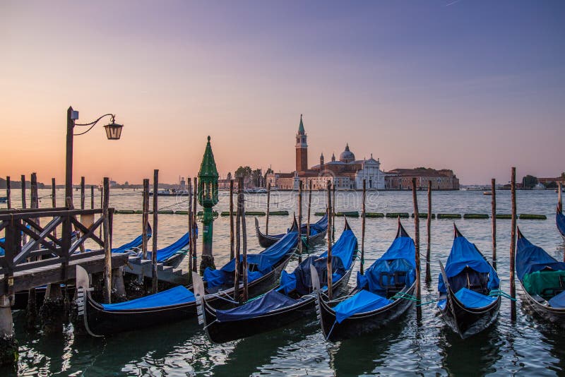 Venice, the capital of northern Italys Veneto region, is built on more than 100 small islands in a lagoon in the Adriatic Sea. It has no roads, just canals, including the Grand Canal thoroughfare, lined with Renaissance and Gothic palaces. The central square, Piazza San Marco, contains St. Marks Basilica, which is tiled with Byzantine mosaics, and the Campanile bell tower offering views of the city red roofs. Venice, the capital of northern Italys Veneto region, is built on more than 100 small islands in a lagoon in the Adriatic Sea. It has no roads, just canals, including the Grand Canal thoroughfare, lined with Renaissance and Gothic palaces. The central square, Piazza San Marco, contains St. Marks Basilica, which is tiled with Byzantine mosaics, and the Campanile bell tower offering views of the city red roofs.