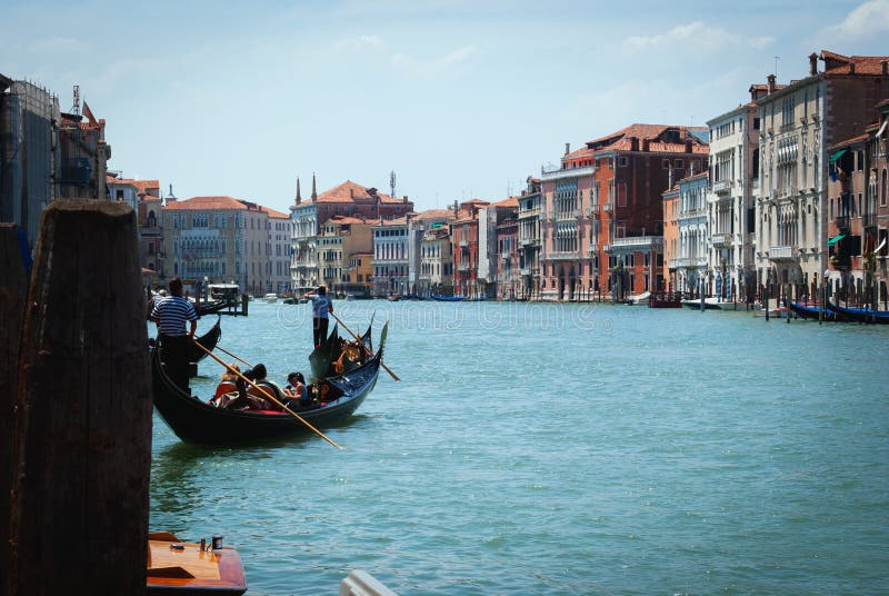 Gondola with passengers floating on the canal Giudecca. Venice. stock image Gondola with passengers floating on the canal Giudecca. Venice. stock image