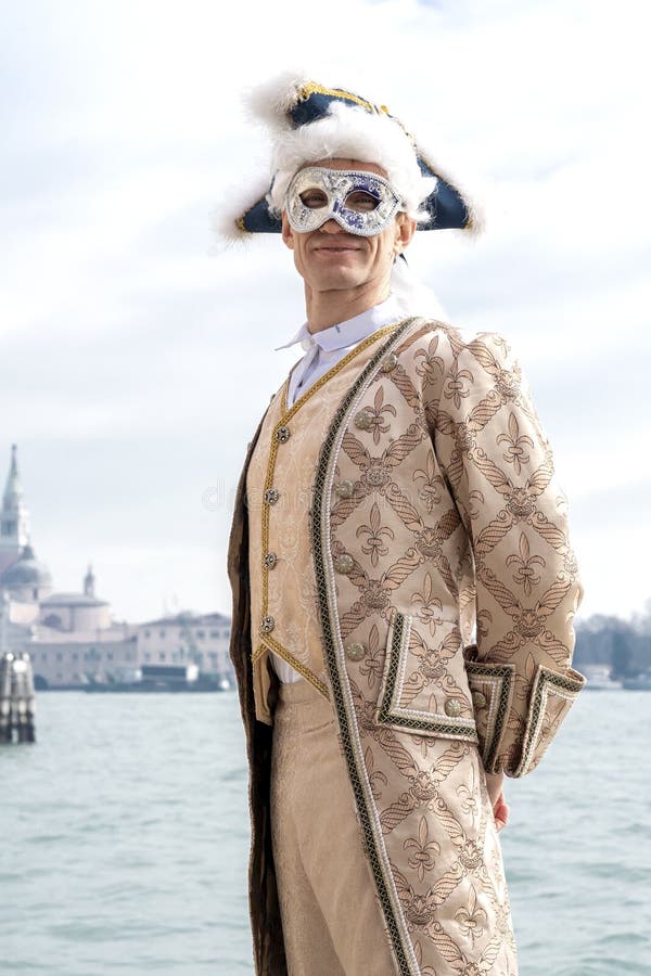 Venice, Itali: February 26, 2019 : Venice carnival 2019. Venetian Carnival Costume. Venetian Carnival Mask. Venice, Italy