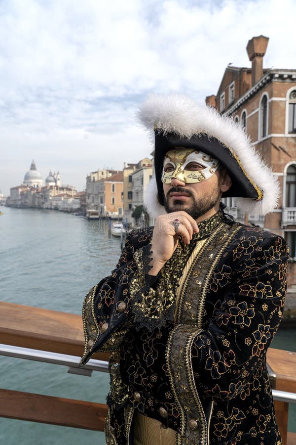 Venice, Itali: February 26, 2019 : Venice carnival 2019. Venetian Carnival Costume. Venetian Carnival Mask. Venice, Italy