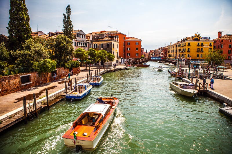 VENICE, ITALY - AUGUST 17, 2016: Retro Brown Taxi Boat on Water in ...