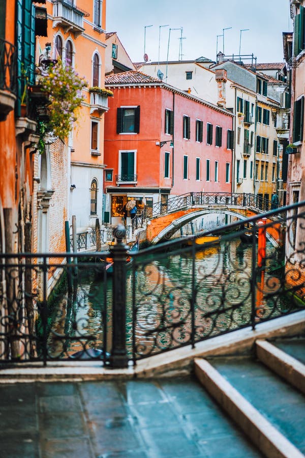 Venice, Italy. The bridge and the colored houses on the shore of a narrow channel stock photography Venice, Italy. The bridge and the colored houses on the shore of a narrow channel stock photography