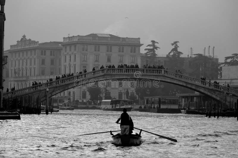 Venice, Italy, December 28, 2018 gondola moving in a canal royalty free stock images