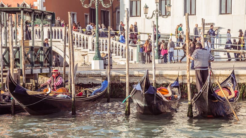 Venice, Italy - October 29, 2016: Gondolas on Canal Grande royalty free stock photo Venice, Italy - October 29, 2016: Gondolas on Canal Grande royalty free stock photo
