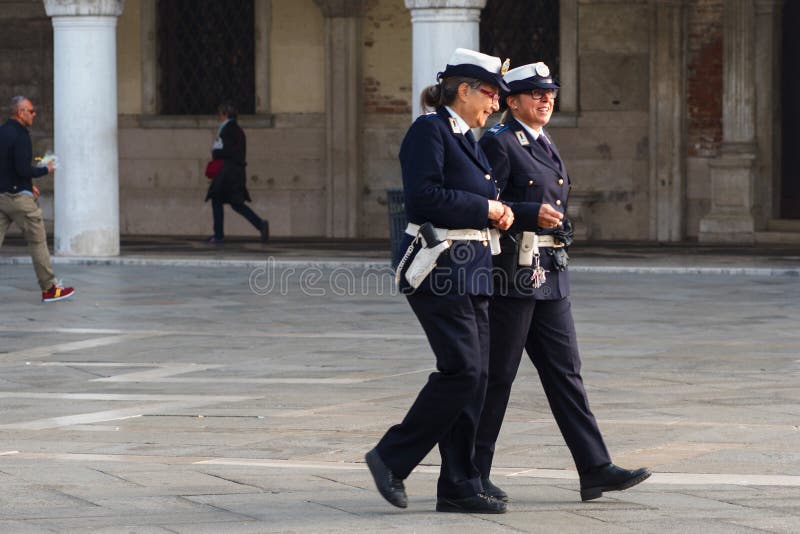 VENICE, ITALY - OCTOBER 6 , 2017: Two Women Police Officers are on the  Square San Marco Editorial Photography - Image of patrol, guard: 101918477