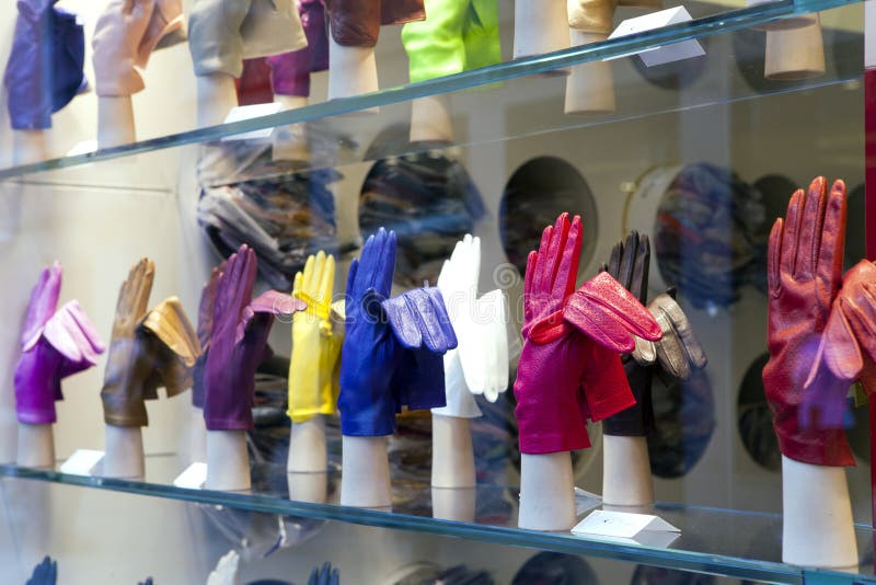 VENICE, ITALY SEPTEMBER 24, 2010 Bright Gloves on a Window of Shop