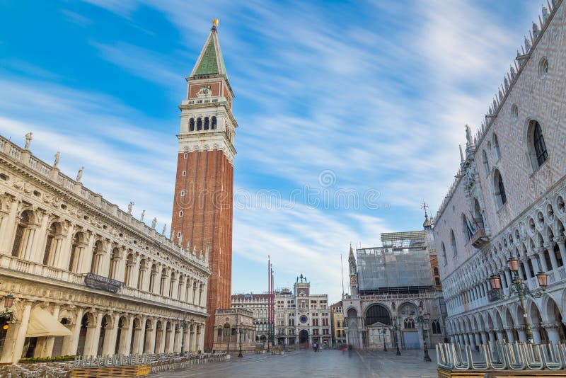 VENICE, ITALY - SEPTEMBER, 2017: Venice symbols San Marco Campanile and Doge palace with blue sky and clouds. World famous Venice
