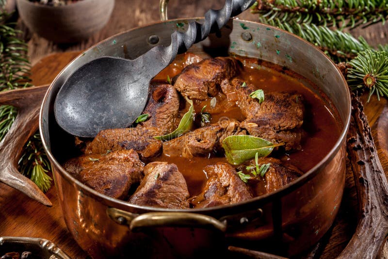 Venison Goulash Stew in Pot with Serving Spoon