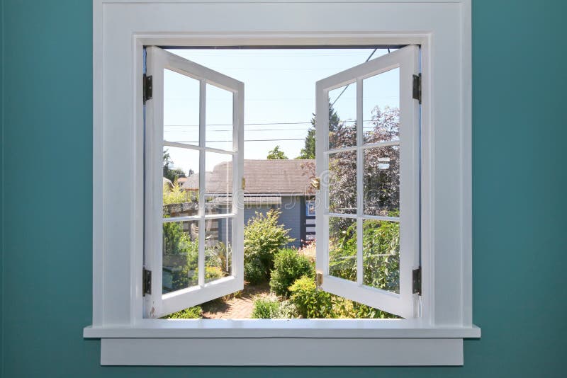 Open window to the back yard with blue wall. Open window to the back yard with blue wall.