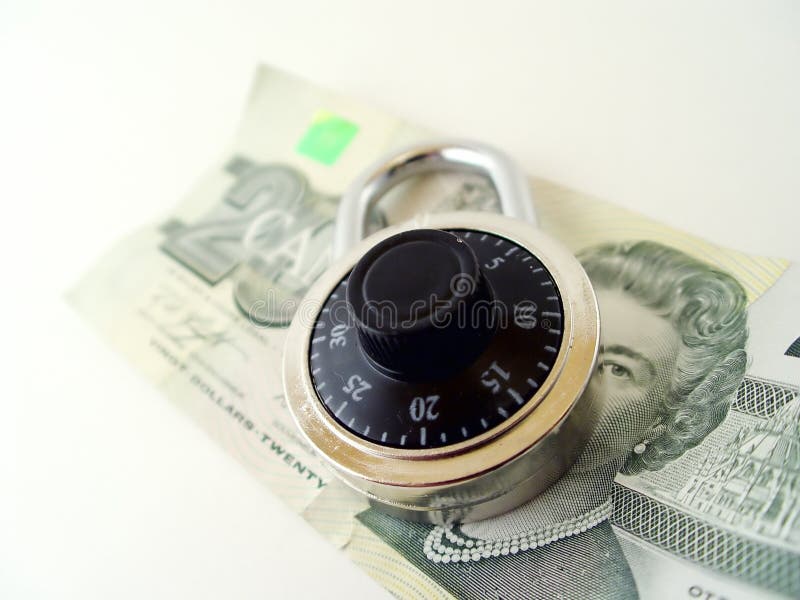 Venti dollari e un lucchetto immagini stock