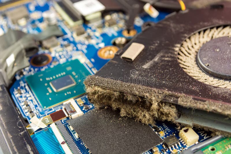 dusty fan inside the laptop during servicing. dusty fan inside the laptop during servicing.