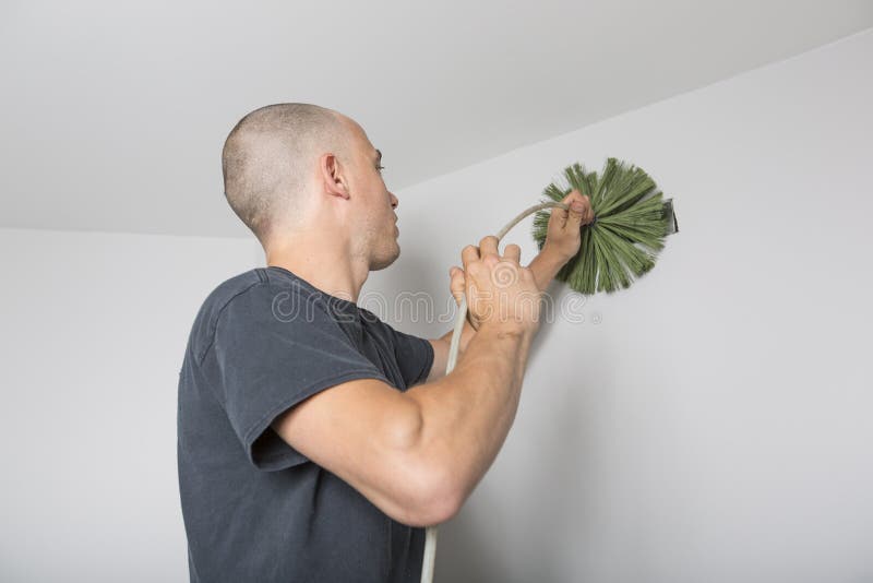 Ventilation cleaner man at work with tool royalty free stock photos