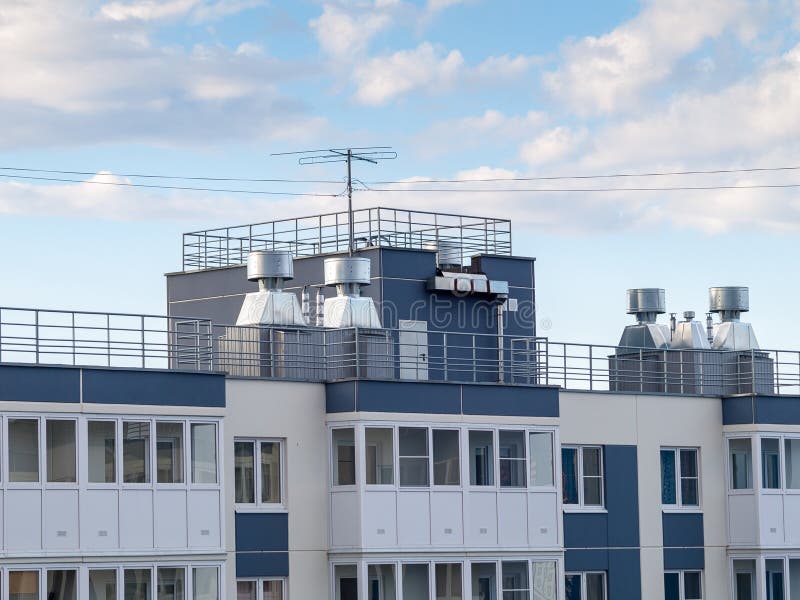 ventilation system and hoods installed on the roof of an apartment building  maintaining the microclimate in the apartments  ventilation and proper air exchange in residential areas