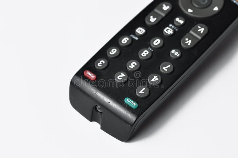 Ver controlemechanisme voor een TV die op een witte achtergrond wordt geïsoleerd De ruimte van het exemplaar stock afbeelding Ver controlemechanisme voor een TV die op een witte achtergrond wordt geïsoleerd De ruimte van het exemplaar stock afbeelding