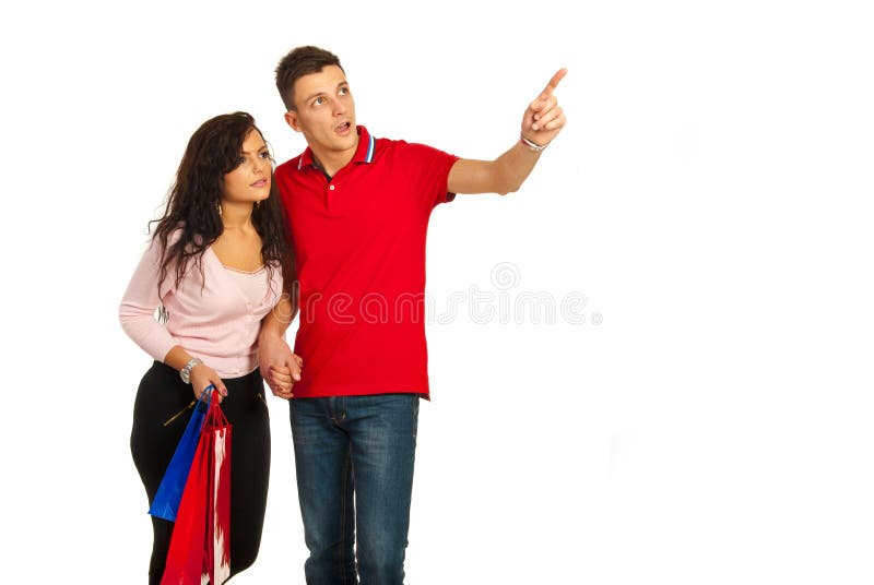 Verbaasd paar die weg kijken royalty-vrije stock fotografie Verbaasd paar die weg kijken royalty-vrije stock fotografie