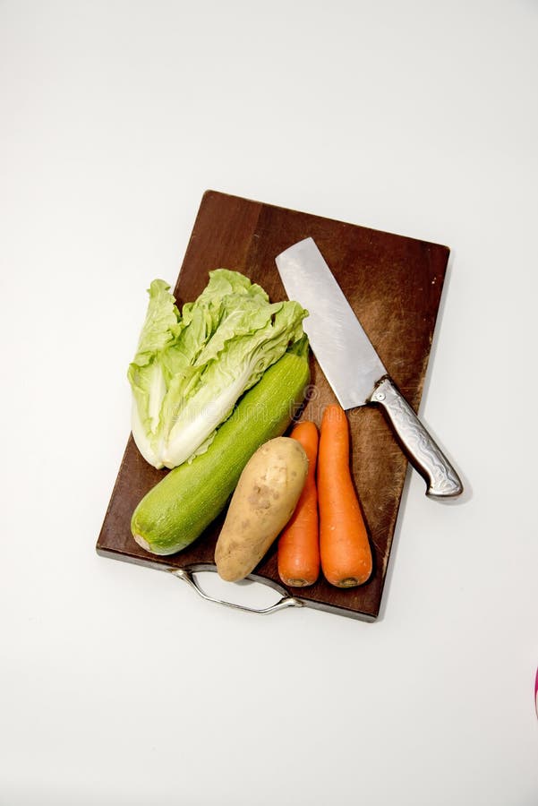 Verduras en la tajadera foto de archivo libre de regalías Verduras en la tajadera foto de archivo libre de regalías