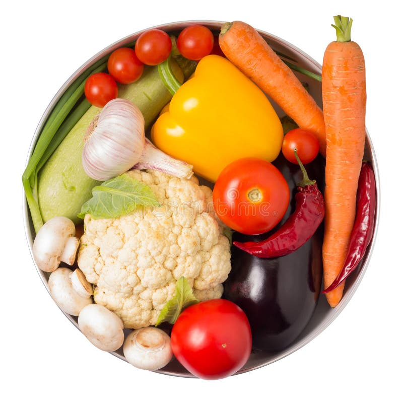 Verduras frescas en un pote aislado en blanco. imagen de archivo Verduras frescas en un pote aislado en blanco. imagen de archivo