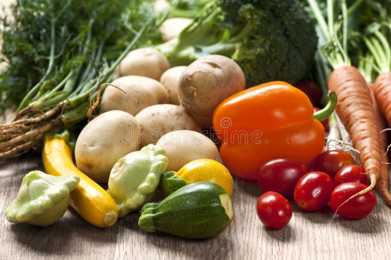 Bunch of whole assorted fresh organic vegetables. Bunch of whole assorted fresh organic vegetables