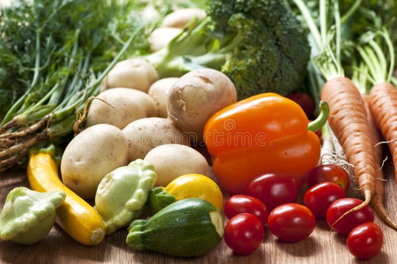 Bunch of whole assorted fresh organic vegetables. Bunch of whole assorted fresh organic vegetables