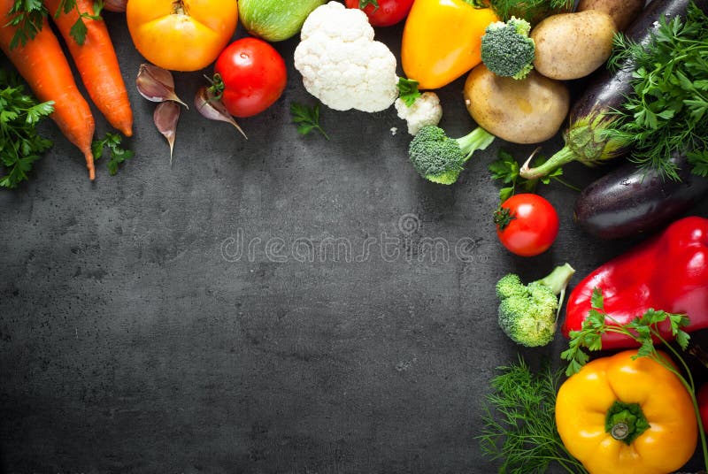 Food background. Fresh farmer vegetables at dark beton table. Space for text. Food background. Fresh farmer vegetables at dark beton table. Space for text.