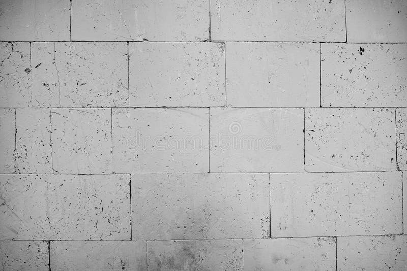 Verkratzte wei? e Backsteinmauer stockbilder