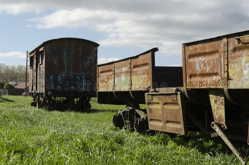 Rauch, Buenos Aires / Argentina; Sept 20, 2014: Abandoned train wagons at Rauch station, Buenos Aires, Argentina. Rauch, Buenos Aires / Argentina; Sept 20, 2014: Abandoned train wagons at Rauch station, Buenos Aires, Argentina