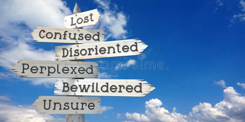 Lost, confused, disoriented, perplexed, bewildered, unsure - wooden signpost with six arrows. Sky with clouds on second plan. Lost, confused, disoriented, perplexed, bewildered, unsure - wooden signpost with six arrows. Sky with clouds on second plan.