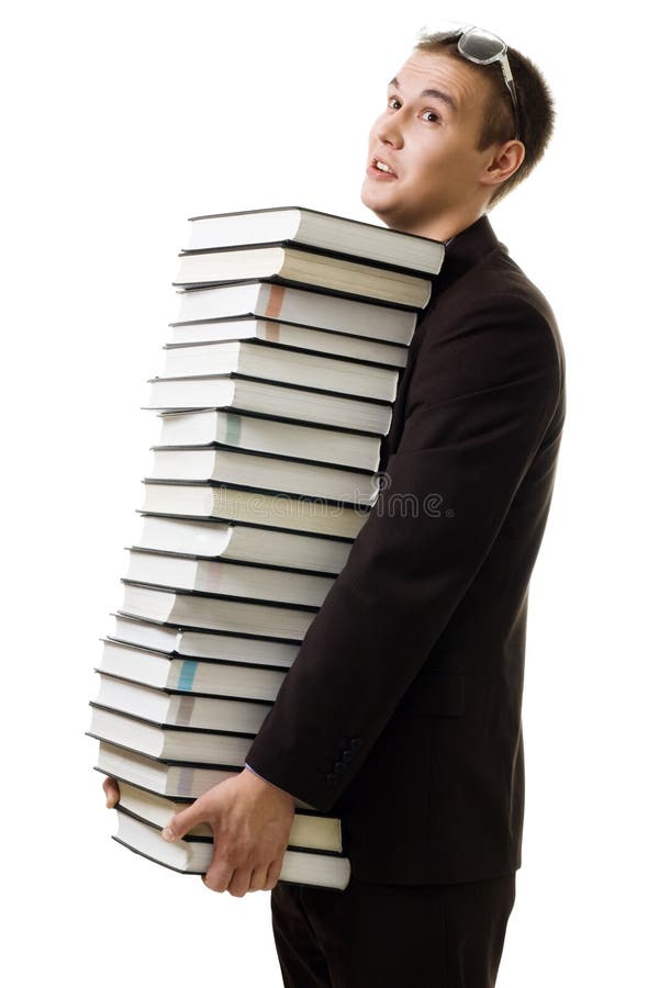 Vermoeide student met vele boeken stock afbeeldingen Vermoeide student met vele boeken stock afbeeldingen