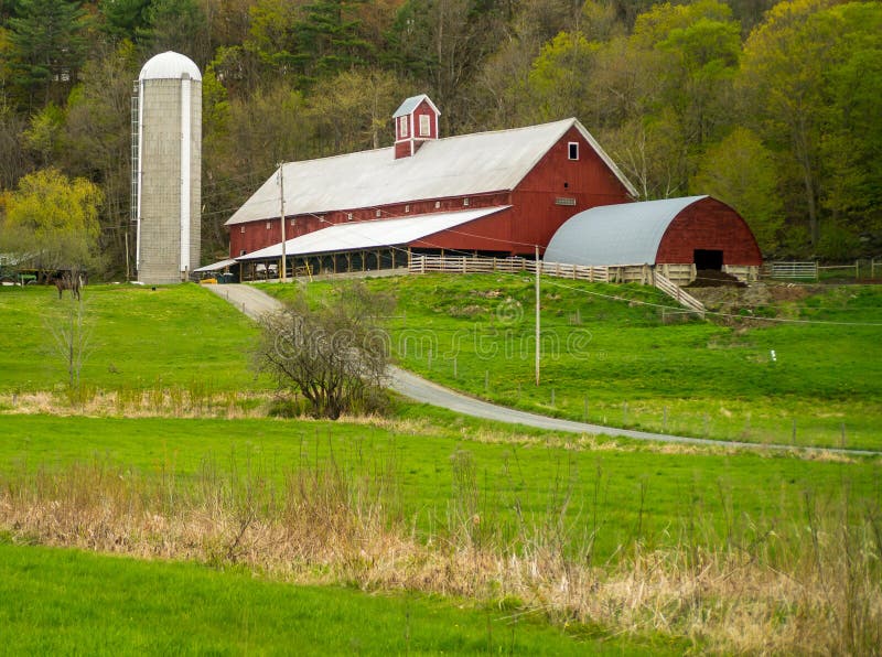 Vermont Farm Scene with red barn silo fields horse