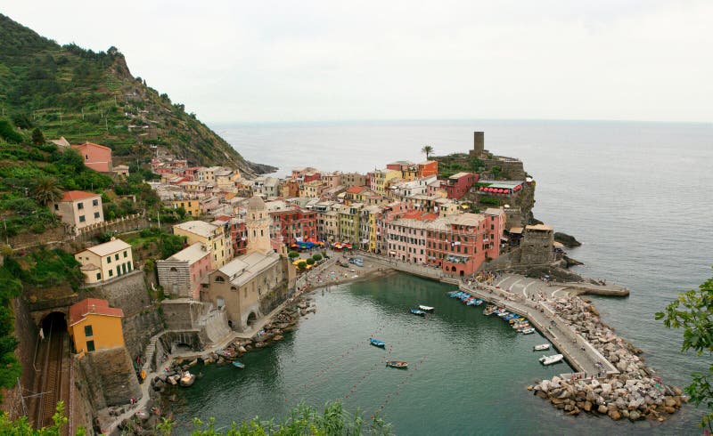 Vernazza is a small town on the Ligurian coast in Italy. Seen from above, this small fishing village has changed recently and today is a tourist hotspot for Italians and foreigners alike. Vernazza is a small town on the Ligurian coast in Italy. Seen from above, this small fishing village has changed recently and today is a tourist hotspot for Italians and foreigners alike.