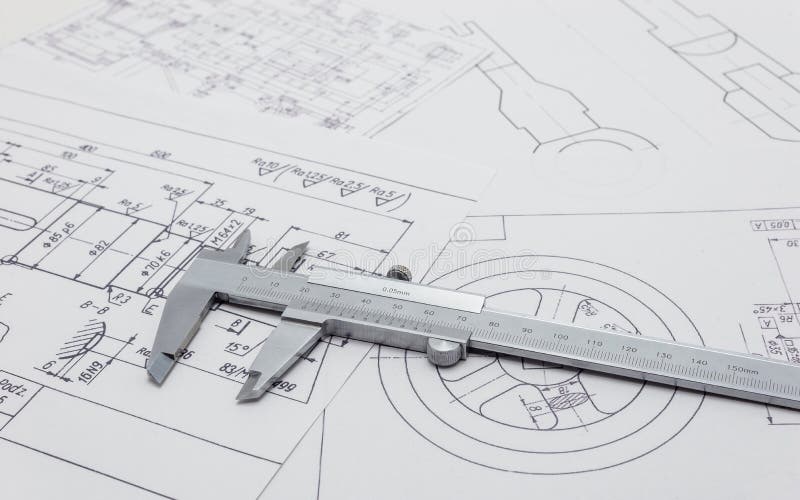 Vernier Caliper Lying on Mechanical Scheme. Stock Photo Image of