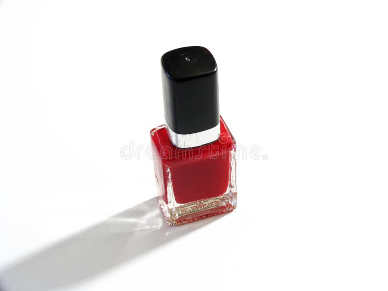 Bottle of red nail polish isolated on white background. Bottle of red nail polish isolated on white background