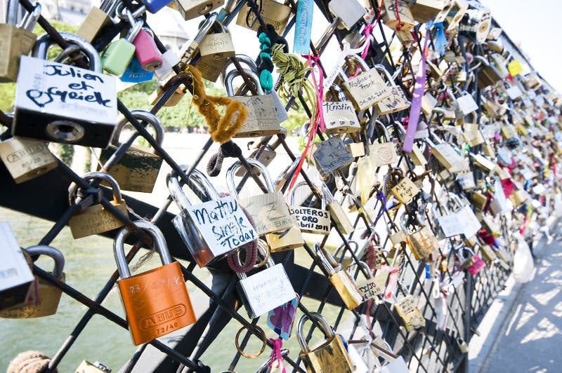Photo of locks on a bridge for people in love, in Paris pont des arts. Photo of locks on a bridge for people in love, in Paris pont des arts