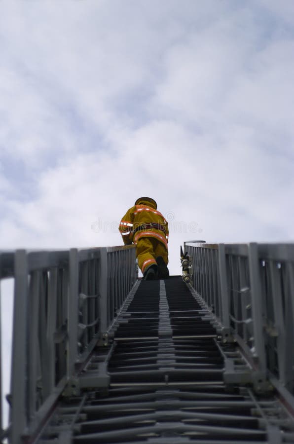 Fireman at top of ladder. Fireman at top of ladder