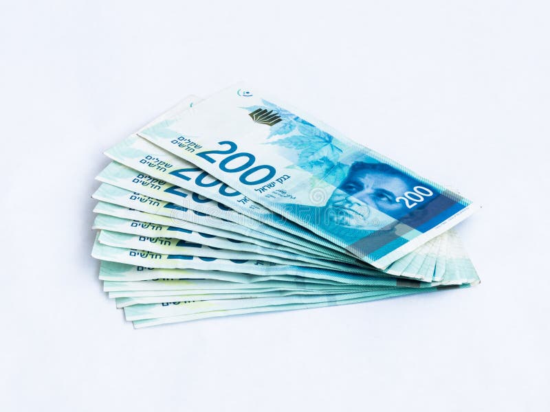Verscheidene nieuwe bankbiljetten met een waarde van 200 Israëlische nieuwe sjekels op een witte achtergrond royalty-vrije stock fotografie Verscheidene nieuwe bankbiljetten met een waarde van 200 Israëlische nieuwe sjekels op een witte achtergrond royalty-vrije stock fotografie