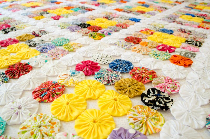 Several pieces of Fuxico sewn together forming a bedspread. handmade. artisanal. craft. colorful. Several pieces of Fuxico sewn together forming a bedspread. handmade. artisanal. craft. colorful.