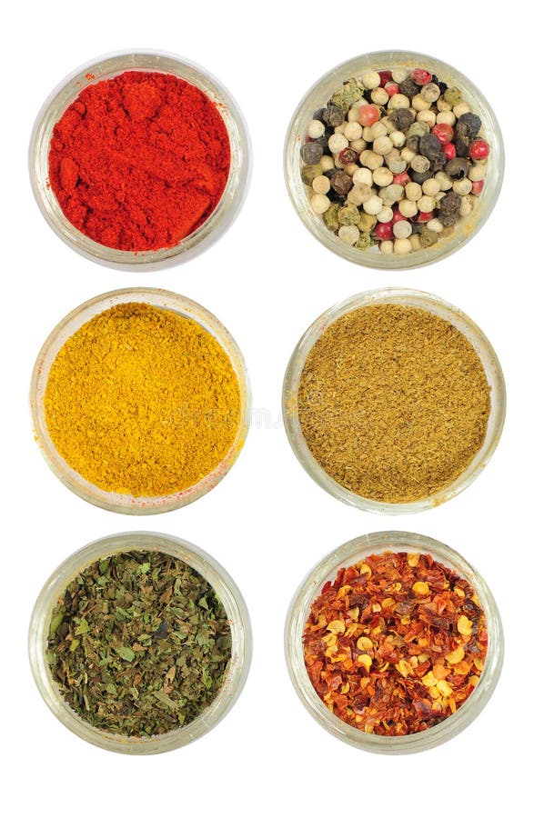 Various colorful spices in round bowls - paprika, pepper, curry, cardamon, oregano, chilli. Various colorful spices in round bowls - paprika, pepper, curry, cardamon, oregano, chilli