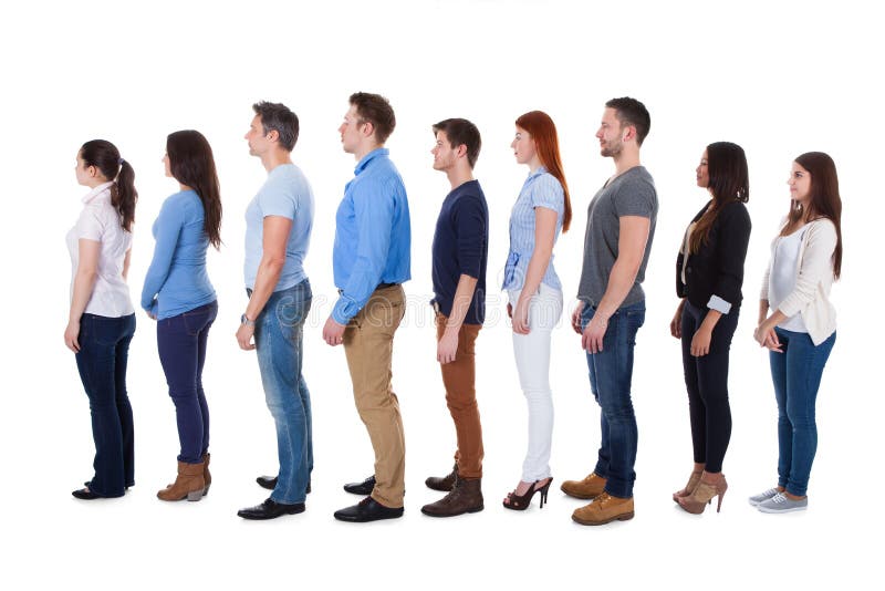 Verschiedene Gruppe von Personen, die in der Reihe steht lizenzfreie stockbilder Verschiedene Gruppe von Personen, die in der Reihe steht lizenzfreie stockbilder