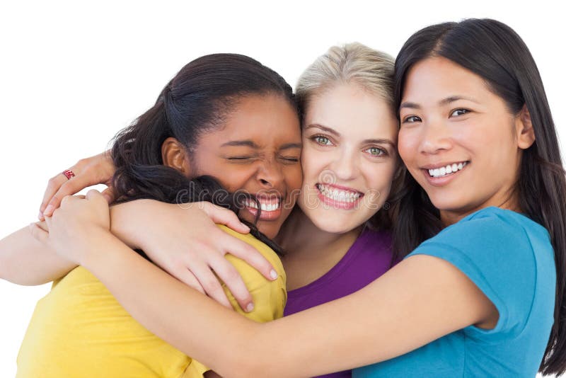 Verschiedene junge Frauen, die sich umarmen stockbild Verschiedene junge Frauen, die sich umarmen stockbild